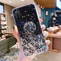 Coque de téléphone en silicone transparente avec paillettes brillantes, adaptée aux téléphones iPhone, Samsung, Huawei, avec support extensible.