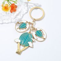 Lot de porte-clés personnalisés en forme de montgolfière bleue, breloques nuage émaillées, anneau en métal doré, souvenir de voyage personnalisé, vente en gros
