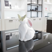 Günstige Fabrik-Keramikfiguren: Hase und Kaninchen mit Schmetterling, Frühlings- und Oster-Deko, Tischzubehör, Dekorative Objekte