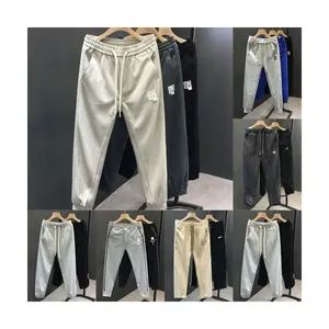 High-quality custom men's casual cotton blank pocket sports pants sports suit elastic loose pants