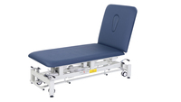 Table de massage électrique portable réglable en hauteur en acier inoxydable avec revêtement en PU et système de repose-pieds pliable pour traitement professionnel
