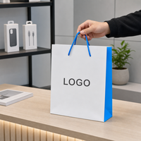Sac de shopping en papier avec logo personnalisé et poignées en corde pour l'emballage de vente au détail d'accessoires de téléphonie mobile