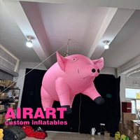 Ballon gonflable de cochon assis, mascotte de cochon rose gonflable de mascotte de dessin animé