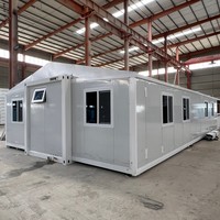 Maison conteneur préfabriquée mobile et extensible à double aile de 20, 30 et 40 pieds avec terrasse pour usage résidentiel, gîtes et hôtels
