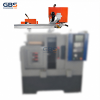 Tour CNC CZGR1000 avec système de chargement et déchargement automatique intégré par robot à poutre, robot industriel de fraisage CNC