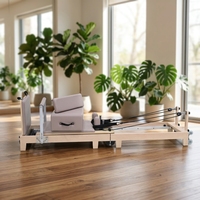 Machine de Pilates Reformer pliable en bois, réglable, de haute qualité, avec logo personnalisé pour studio, fabrication CE professionnelle