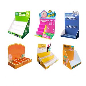 ชั้นวางสินค้าแบบตั้งพื้นสำหรับขนม ของเล่น และสินค้าอื่นๆ วัสดุ Forex PVC สำหรับวางบนเคาน์เตอร์ ดีไซน์ทันสมัย ปรับแต่งได้ตามต้องการ พร้อมใบรับรอง CE - Product Image 1