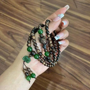 สร้อยข้อมือลูกปัดไม้กฤษณาเวียดนามคุณภาพสูง ทำจากไม้กฤษณาธรรมชาติ ลูกปัดสำหรับสวดมนต์ ไม้กฤษณาธรรมชาติคุณภาพสูง - Product Image 1