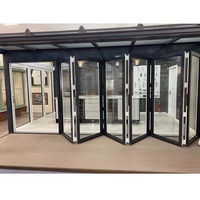Porte coulissante pliante moderne à double vitrage en verre trempé, à économie d'énergie, pour l'extérieur, le jardin et le garage