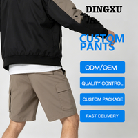 Shorts de travail à poches verticales pour hommes, couleur taupe, taille élastique, braguette boutonnée, passants de ceinture, poches à bouton-pression, coupe ample, longueur mi-cuisse, pour la randonnée