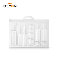 BSCI WCA ISO9001 13 en 1 ensemble de voyage de pot de bouteille en plastique avec le pulvérisateur lisse de 26ml 34ml bouchon de disque de 53ml 40ml pot de 5ml 10ml 15ml 20ml