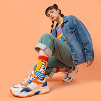 Chaussettes fantaisie en gros, asymétriques, bicolores, motif chiot, streetwear, en coton pour femmes