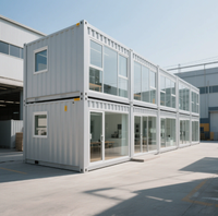 Maison conteneur préfabriquée modulaire en acier de 20 pieds avec mur rideau en verre pour bureau, studio, jardin, extérieur