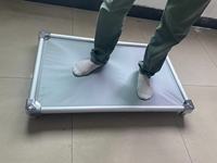 Lit pour chien surélevé à montage sans outils, confortable et portable, adapté aux intérieurs et aux patios