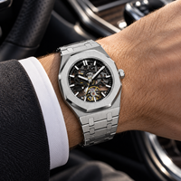 100 montres mécaniques squelette OEM en acier inoxydable pour hommes, cadran personnalisé, montre-bracelet automatique haut de gamme, verre minéral, lumineuses