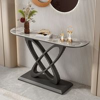 Console élégante noire pour entrée avec structure en métal, plateau en bois et marbre, table moderne pour hôtels, salon ou couloir