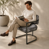 Chaise de salle à manger moderne à structure métallique cantilever, fauteuil rembourré à motif abstrait imprimé pour projets hôteliers et villas de luxe