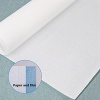 Rouleau de draps jetables en papier laminé pour examen médical, imperméable, résistant à l'huile, épaissi, personnalisable, désinfecté à l'ozone