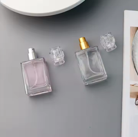 Vente chaude en gros de luxe 100ml 50ml bouteilles de luxe de parfum transparent tailles portables et rechargeables pulvérisateur à pompe en stock