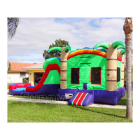 Château gonflable tropical combiné pour enfants avec toboggan aquatique, capacité de 500 kg, installation facile, usage commercial