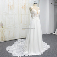 Robe de mariée sirène de luxe romantique avec appliques en dentelle, détails floraux 3D perlés et pailletés, style moderne, magnifique traîne chapelle