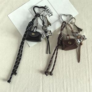 Hot-selling Instagram-style Cute Style <b>Leather</b> Mini Bag <b>Keychain</b> Niche Pendant Creative Schoolbag Wholesale - Product Image 3