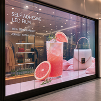 Film LED transparent adhésif pour vitrine de magasin, à coller sur le verre.