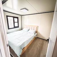 Maison pliante extensible à double aile personnalisée, préfabriquée, modulaire, portable, pour le camping et l'hôtellerie