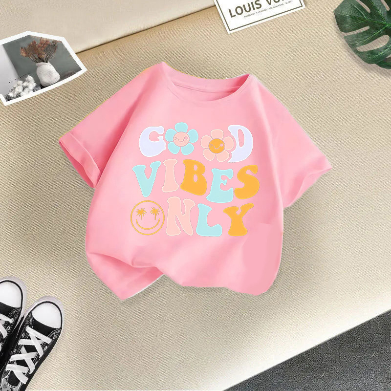 Pink t-shirt with two smiling flowers