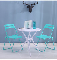 Table d'appoint pour salle à manger ronde et basse polyvalente pour l'extérieur, avec gain de place dans le patio et le jardin.