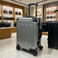 Valise à roulettes rigide unisexe personnalisée en usine, 20 pouces, en polycarbonate, avec cadre en aluminium, résistante à l'eau et aux rayures