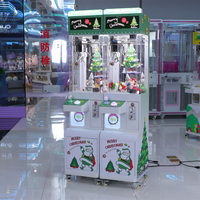 Jouet en peluche vert de Style de Noël petite Machine à griffes de grue avec lecteur de cartes de prix d'accepteur de facture pour enfants Mini Machine à griffes