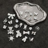 Breloques pour sabots – Nouveauté Xiaohongshu, best-seller, décorations haut de gamme en plastique argenté pour chaussures : nœuds, papillons, cœurs