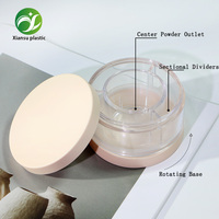 Boîte à maquillage en plastique recyclable avec fond rotatif, distributeur central et compartiments multiples pour poudre libre