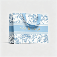 Sac en papier biodégradable de qualité supérieure avec ceinture intérieure invisible, carton ivoire 190-230 g/m², gaufrage personnalisé pour emballage de vêtements