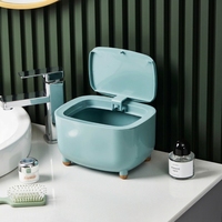 Poubelle de bureau miniature ovale WONFUN JEEZAO PP avec couvercle à ressort pour cuisine et salle de bain (bleu clair)