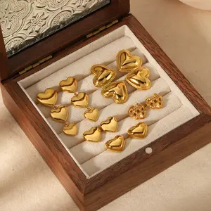 أقراط مرصعة بقلب مزدوج أنيقة للبيع بالجملة أقراط مجوهرات مطلية بالذهب عيار 18 من الفولاذ المقاوم للصدأ