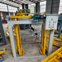 Machine de superposition de palettes double entièrement automatique pour machine à fabriquer des blocs