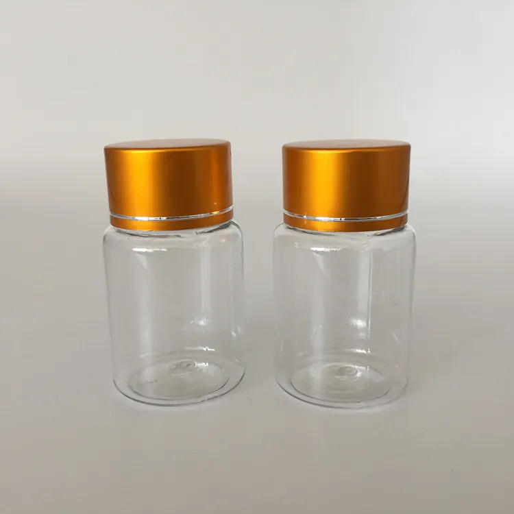 Wholesale plastic PET 20ml clear capsule pill bottle with gold screw cap, pharmaceutical packing bottle container