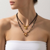 Collier superposé avec pendentif en forme de cœur en acier inoxydable et perles en pierre naturelle pour femmes