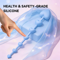 Perles anales en silicone en forme de cœur avec perles graduées flexibles et poignée facile à saisir