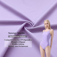 Tissu de vêtements de sport et de maillots de bain à séchage rapide, écologique, protection anti-UV, tricot warp extensible en polyamide, nylon et élasthanne lisse