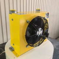 Échangeur de chaleur industriel refroidi par air en alliage d'aluminium avec ventilateur 220V, débit de 150L/min pour le refroidissement des machines de construction