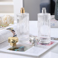 Flacon de parfum vide de luxe en verre, forme cylindrique rayée, 150 ml avec couvercle, par le fabricant
