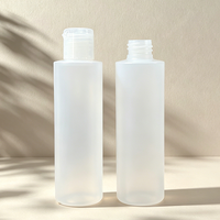 Bouteille en PE de 100 ml, ronde et fine, avec bouchon à clapet, pour shampoing, lotion, articles de toilette, emballage de voyage, personnalisable, directement de l'usine