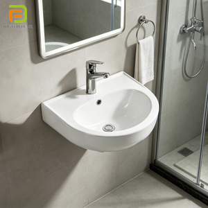 Lavabo mural d'angle compact en céramique pour salle de bain, idéal pour appartement - Sanitaire mural mini - Product Image 1