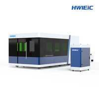 Machine de découpe laser à fibre de type portique à table d'échange automatique haute vitesse, refroidissement par eau, nouvelle pour tôles métalliques