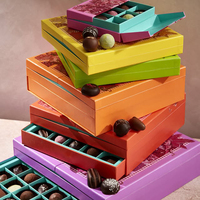 Maßgefertigte Leere Hochwertige Schokoladenboxen aus Recyclingmaterialien mit UV-Beschichtung in Buchform mit Karton- und Papiertrennwänden für Geschenke