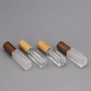 ขวดน้ำหอมแก้วฝ้า 5 มล. แบบพ่นสี่เหลี่ยมผืนผ้า พร้อมฝาไม้ พกพาสะดวก - Product Image 2