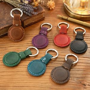 เคสหนังแท้สำหรับติดตามตำแหน่ง ใช้ได้กับอุปกรณ์ป้องกันการสูญหาย  ทำจากหนังวัว พร้อมพวงกุญแจป้องกันสัตว์เลี้ยงหาย - Product Image 1
